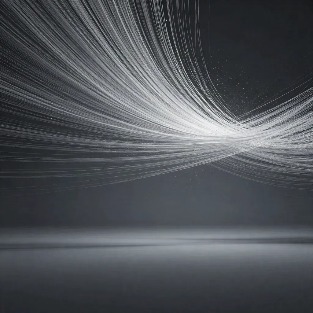 Silver light filaments converge into a soft bloom in a dark graphite void.